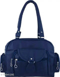 "Chic Blue Canvas Leather Handbag with sturdy leather handles"