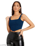  blue sleeveless corset crop top, black leather pants and gold earrings, exuding a stylish and bold vibe.