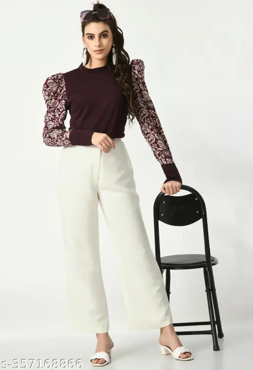 brown top with intricate floral-patterned puffed sleeves