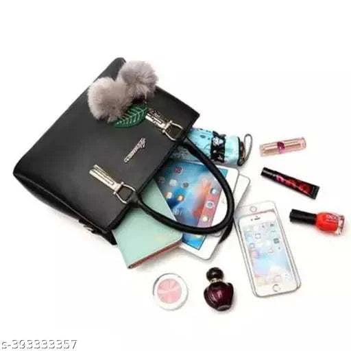 Trendy women handbag in black with stylish design.