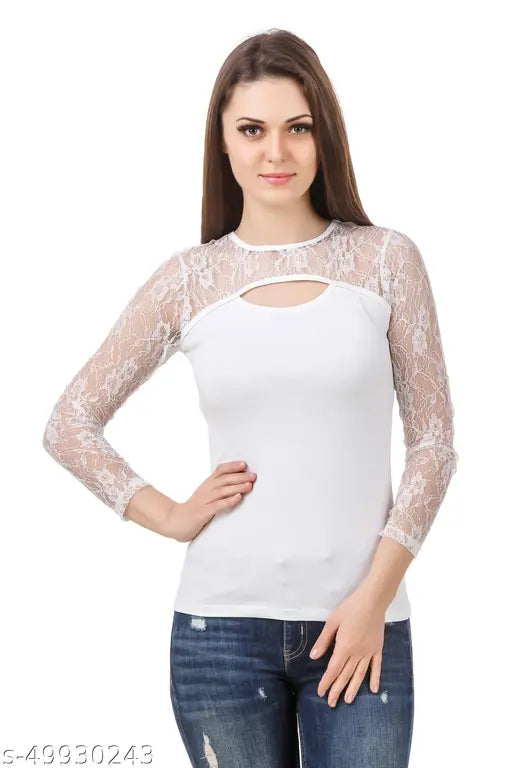 white top with lace sleeves and a keyhole neckline stands confidently. She pairs it with distressed jeans, exuding a stylish and composed vibe.